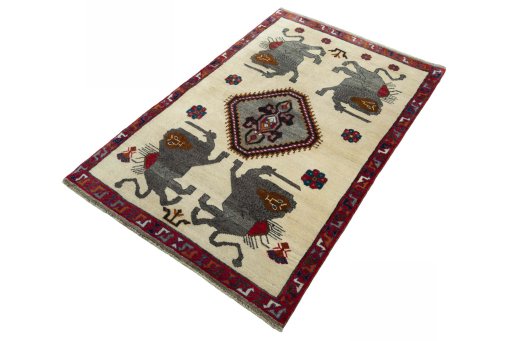 Corner detail of 2000s Persian Gabbeh rug showing border pattern and Wool pile