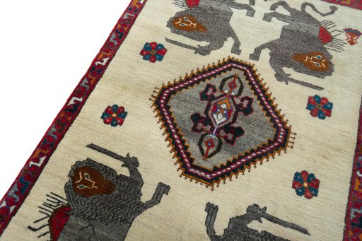 Backside of handmade 2000s Persian Gabbeh rug showing knot structure and weave density