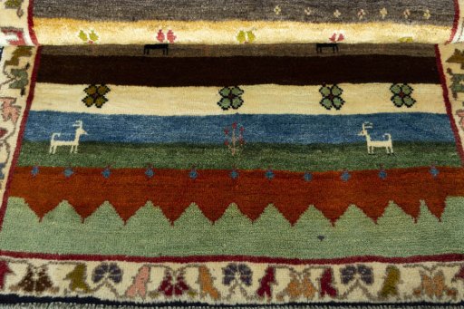 Close-up detail of 2000s Persian Gabbeh rug from Iran / Persia showing Wool weave