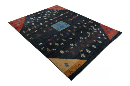 Close-up detail of 2000s Persian Gabbeh rug from Iran / Persia showing Wool weave