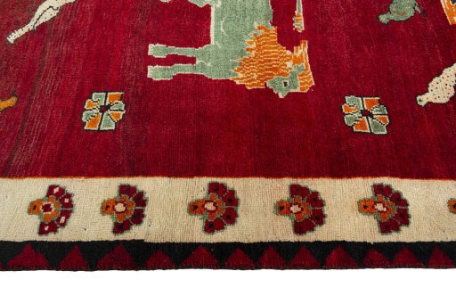 Full view of 2000s Persian Gabbeh rug from Iran / Persia, 234 × 134 cm in Red tones