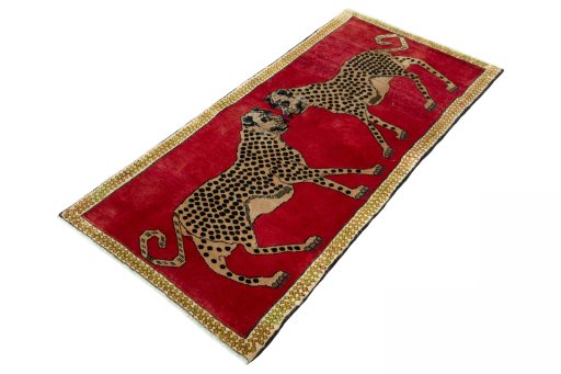 Corner detail of 2000s Persian Gabbeh rug showing border pattern and Wool pile