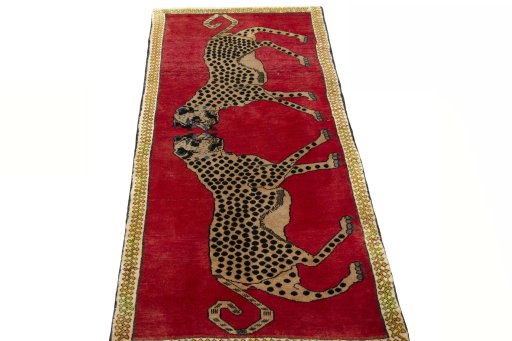 Surface texture of 2000s Persian Gabbeh rug with natural Wool and intricate pattern