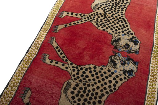 Backside of handmade 2000s Persian Gabbeh rug showing knot structure and weave density