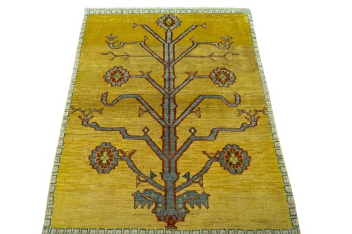 Surface texture of 2000s Persian Gabbeh rug with natural Wool and intricate pattern