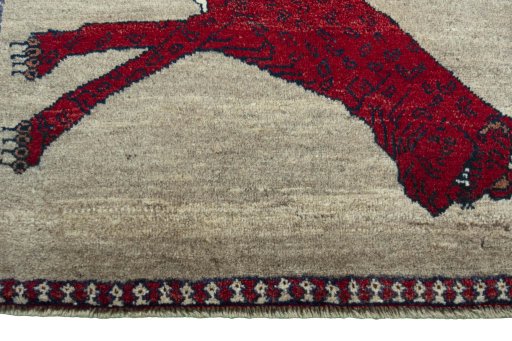 Backside of handmade 2000s Persian Gabbeh rug showing knot structure and weave density
