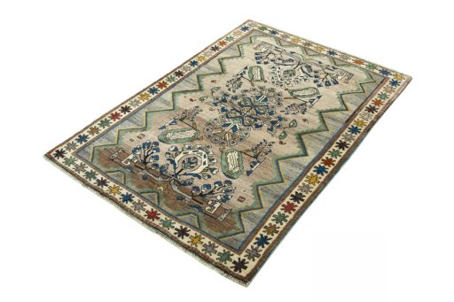 Corner detail of 2000s Persian Gabbeh rug showing border pattern and Wool pile