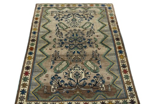 Surface texture of 2000s Persian Gabbeh rug with natural Wool and intricate pattern