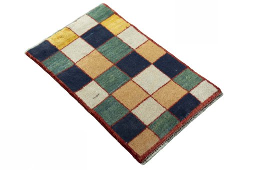 Close-up detail of 2000s Persian Gabbeh rug from Iran / Persia showing Wool weave