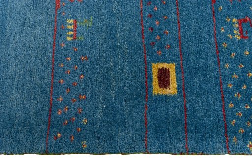 Close-up detail of 2000s Persian Gabbeh rug from Iran / Persia showing Wool weave