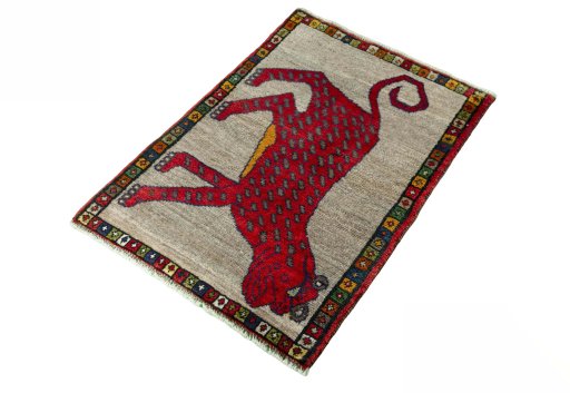 Corner detail of 2000s Persian Gabbeh rug showing border pattern and Wool pile