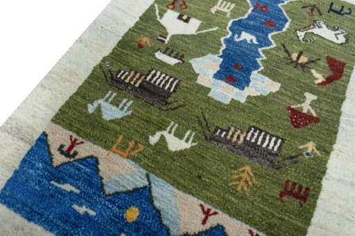 Backside of handmade 2000s Persian Gabbeh rug showing knot structure and weave density