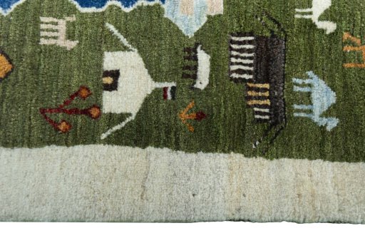 Close-up detail of 2000s Persian Gabbeh rug from Iran / Persia showing Wool weave