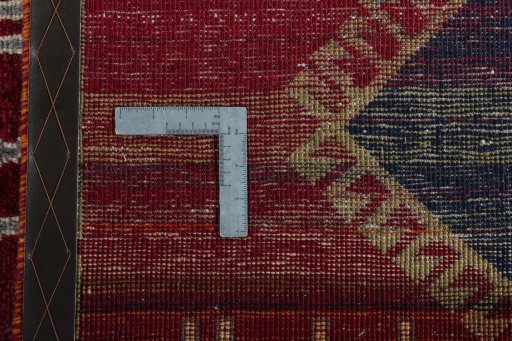 Close-up detail of 2000s Persian Gabbeh rug from Iran / Persia showing Wool weave