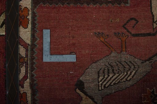 Close-up detail of 2000s Persian Gabbeh rug from Iran / Persia showing Wool weave