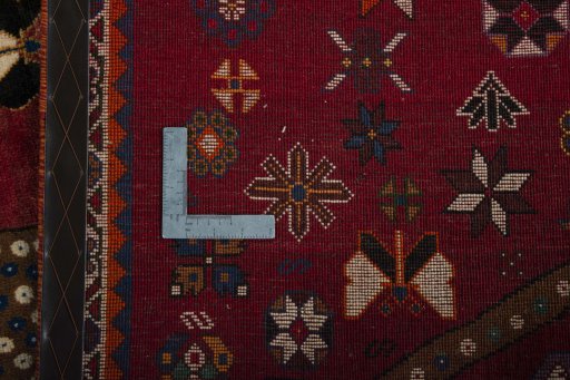 Close-up detail of 2000s Persian Gabbeh rug from Iran / Persia showing Wool weave