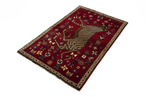 Corner detail of 2000s Persian Gabbeh rug showing border pattern and Wool pile