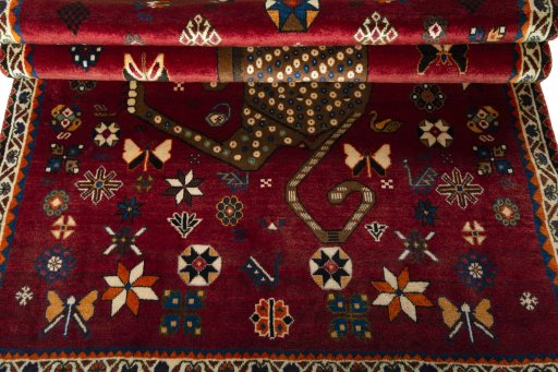 Full view of 2000s Persian Gabbeh rug from Iran / Persia, 192 × 122 cm in Red tones