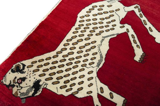 Backside of handmade 2000s Persian Gabbeh rug showing knot structure and weave density