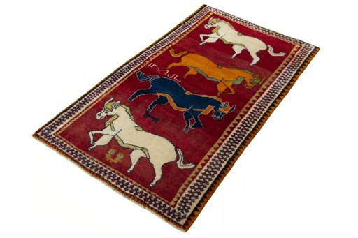 Corner detail of 2000s Persian Gabbeh rug showing border pattern and Wool pile