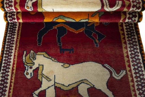 Full view of 2000s Persian Gabbeh rug from Iran / Persia, 202 × 112 cm in Red tones