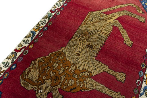 Backside of handmade 2000s Persian Gabbeh rug showing knot structure and weave density