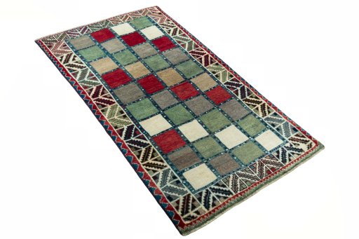 Close-up detail of 2000s Persian Gabbeh rug from Iran / Persia showing Wool weave