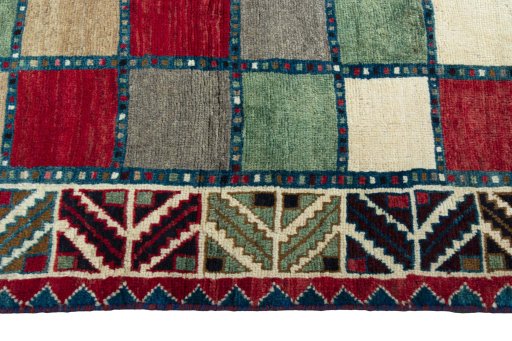 Close-up detail of 2000s Persian Gabbeh rug from Iran / Persia showing Wool weave