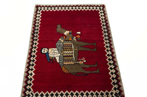 Surface texture of 2000s Persian Gabbeh rug with natural Wool and intricate pattern