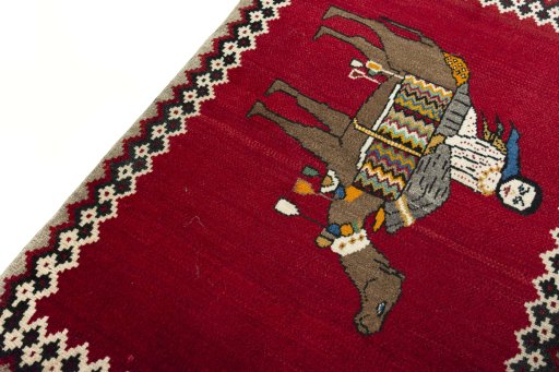 Backside of handmade 2000s Persian Gabbeh rug showing knot structure and weave density