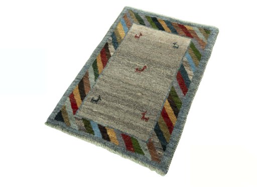 Corner detail of New Persian Gabbeh rug showing border pattern and Wool pile