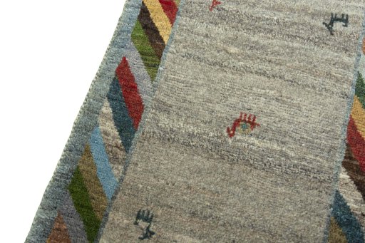 Backside of handmade New Persian Gabbeh rug showing knot structure and weave density