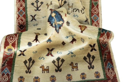 Corner detail of New Persian Gabbeh rug showing border pattern and Wool pile