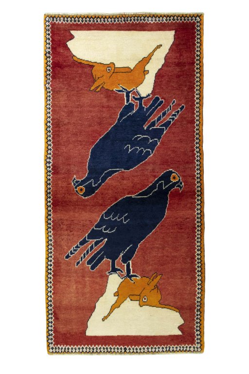 Full view of 2000s Persian Gabbeh rug from Iran / Persia, 180 × 85 cm in Red tones