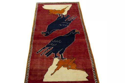 Surface texture of 2000s Persian Gabbeh rug with natural Wool and intricate pattern