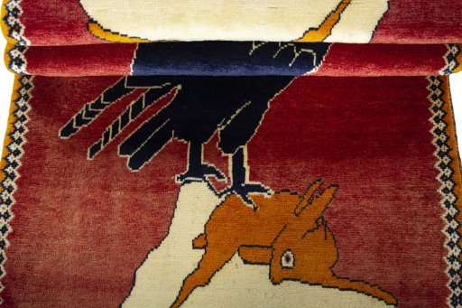 Full view of 2000s Persian Gabbeh rug from Iran / Persia, 180 × 85 cm in Red tones