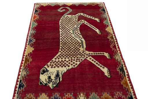 Surface texture of 2000s Persian Gabbeh rug with natural Wool and intricate pattern