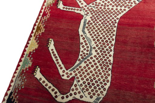 Backside of handmade 2000s Persian Gabbeh rug showing knot structure and weave density