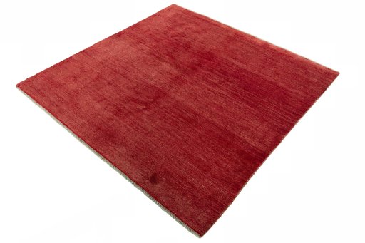 Corner detail of New Persian Gabbeh rug showing border pattern and Wool pile