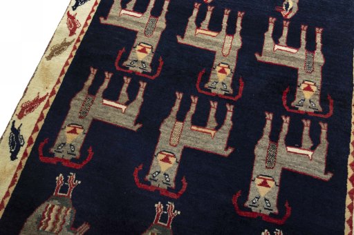 Backside of handmade 2000s Persian Gabbeh rug showing knot structure and weave density