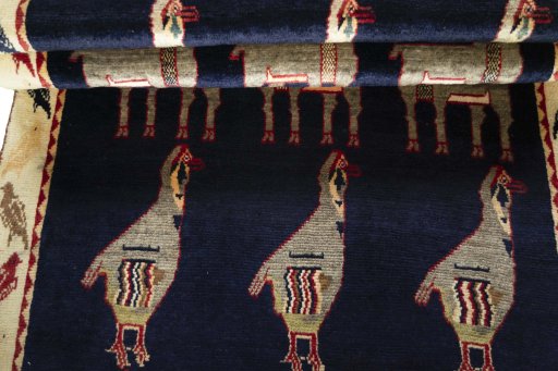 Full view of 2000s Persian Gabbeh rug from Iran / Persia, 188 × 112 cm in Blue tones