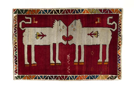 Full view of 2000s Persian Gabbeh rug from Iran / Persia, 147 × 100 cm in Red tones