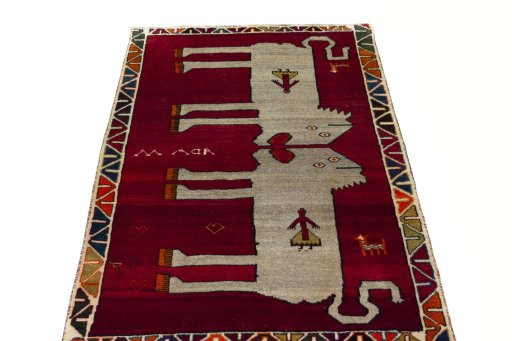 Surface texture of 2000s Persian Gabbeh rug with natural Wool and intricate pattern