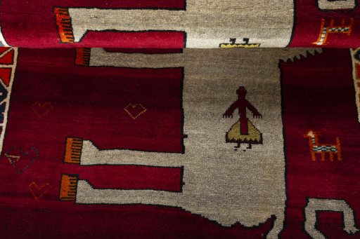 Full view of 2000s Persian Gabbeh rug from Iran / Persia, 147 × 100 cm in Red tones