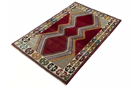 Corner detail of 2000s Persian Gabbeh rug showing border pattern and Wool pile