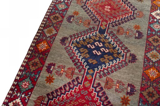Backside of handmade 2000s Persian Gabbeh rug showing knot structure and weave density