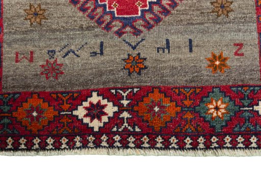 Central medallion detail of 2000s Persian Gabbeh rug from Iran / Persia