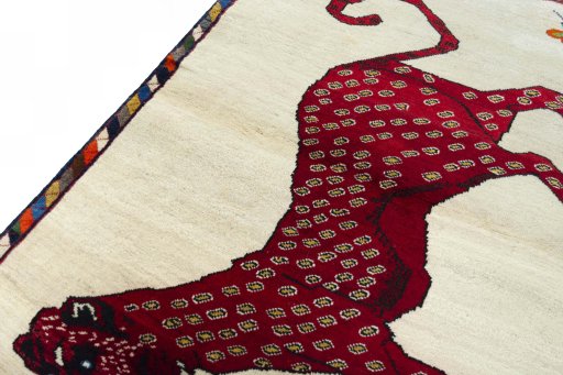 Backside of handmade 2000s Persian Gabbeh rug showing knot structure and weave density