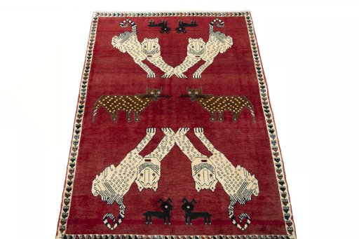 Surface texture of 2000s Persian Gabbeh rug with natural Wool and intricate pattern