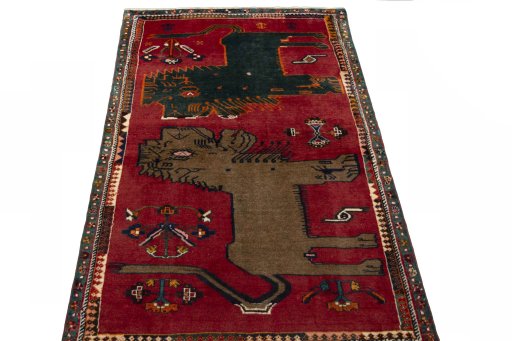 Surface texture of 2000s Persian Gabbeh rug with natural Wool and intricate pattern